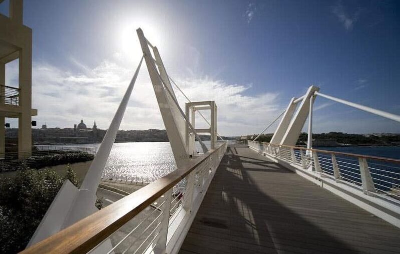 bridge with blue sky - rent villa in tigne point malta 